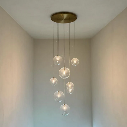 Novi 9 pendant lamp, white/bronze | transparent cords